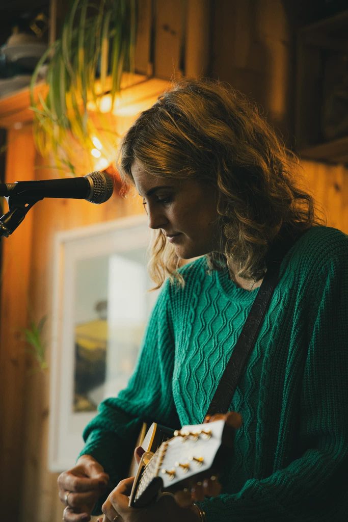Kat playing live music in Cornwall